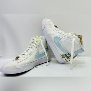 Nike Mid-Top Sneakers in White with Light Blue Swoosh